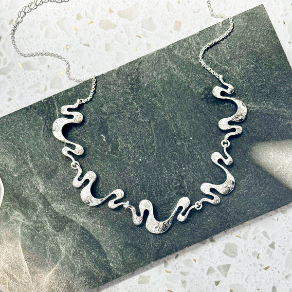 Three clearance wave necklace