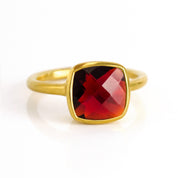 Garnet gold plated cushion bezel square stacking ring on white background. January birthday, January gemstone, square gemstone, red ring, red birthstone, sterling silver, january red