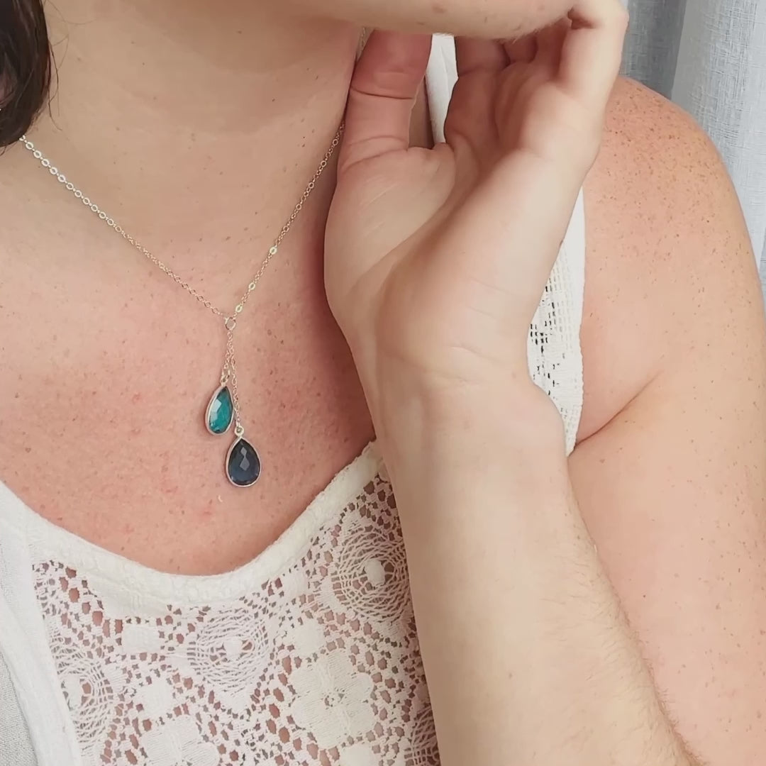 A video showing lariat necklaces in action.  Custom birthstone lariat necklace, cascading birthstones jewelry, gold lariat necklace, silver lariat, rose gold birthstone necklace, personalized family necklace, custom gemstone jewelry, birthstone drop necklace, elegant gift for her, multi-gemstone necklace, chic lariat