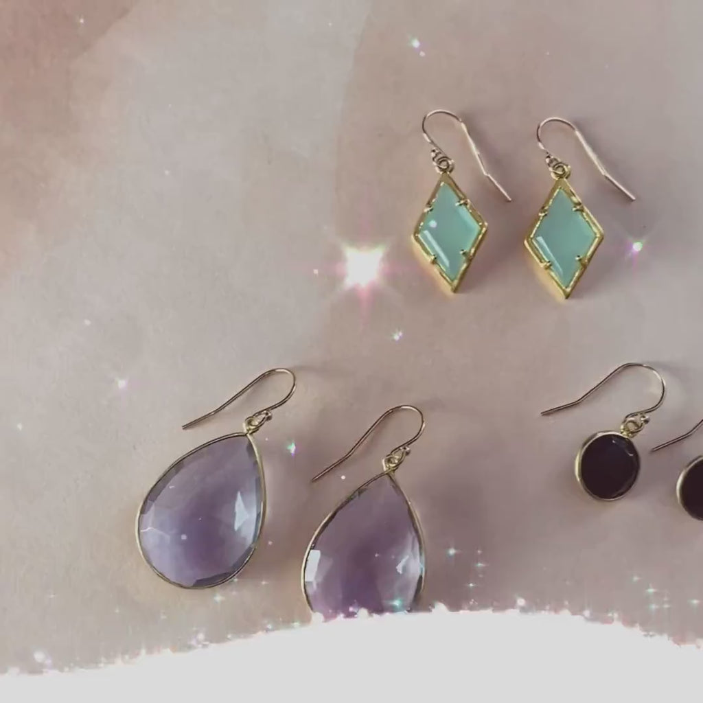 Video collection of our large, small round and large, medium small teardrop birthstone dangle earrings. 