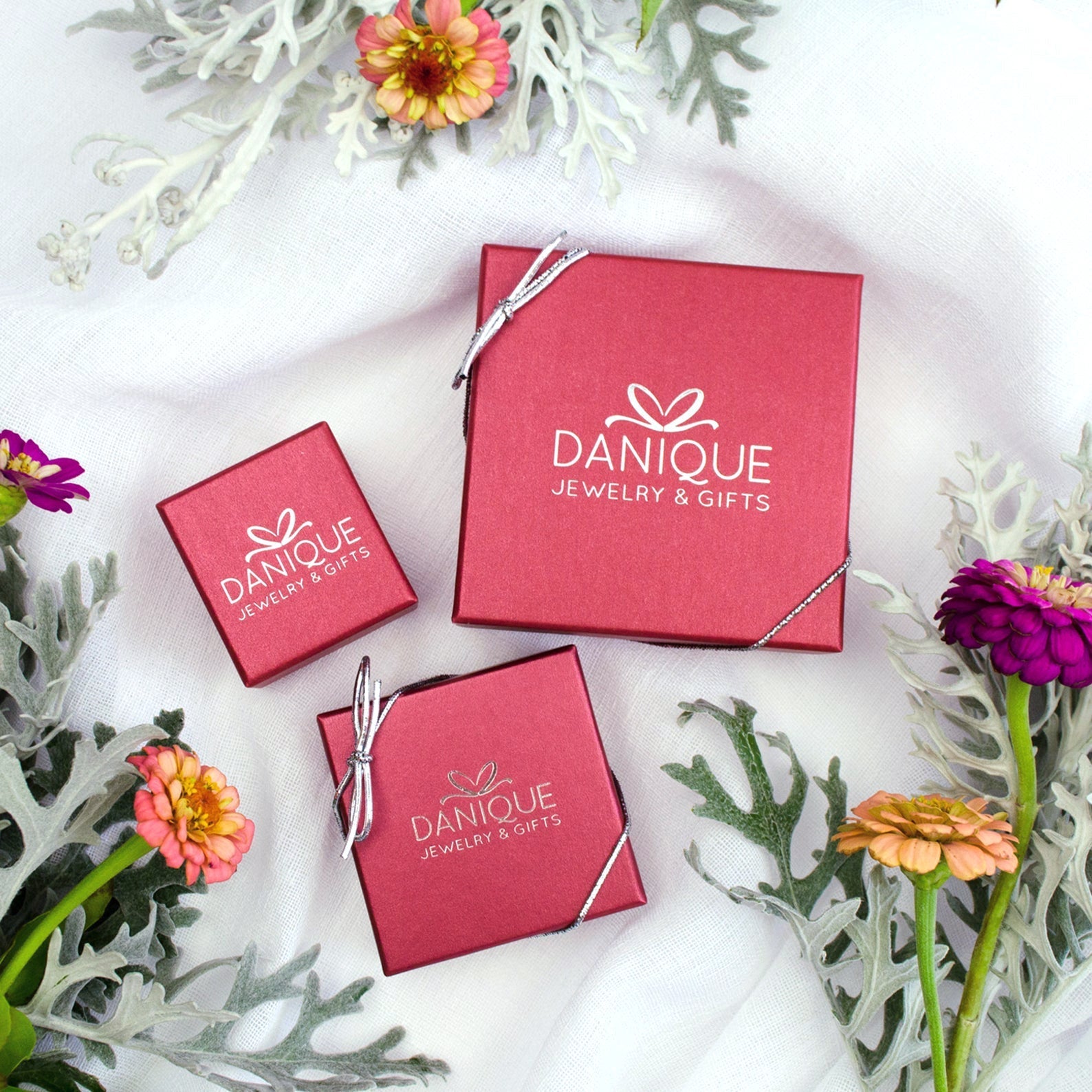 Danique jewelry has a fantastic variety of personalized jewelry and gift products packaged in a red box ready for gift giving. All products ship in 1-2 days. Expedited delivery is available