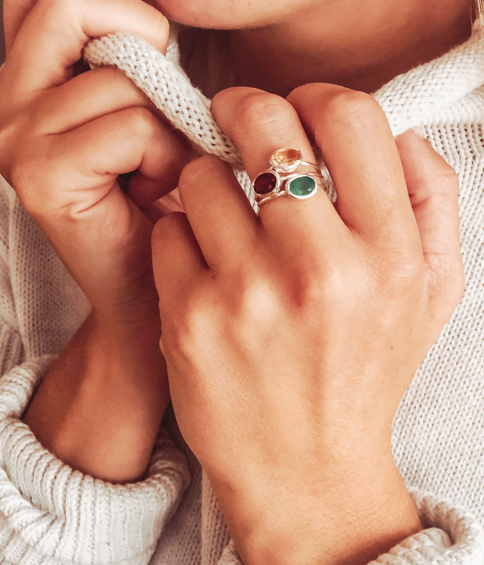 small-oval-rings-on-hand-stacking.jpg