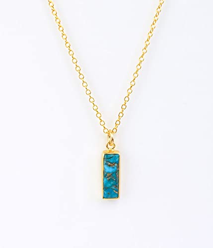 Vertical copper turquoise Adira bar necklace with gold filled cable chain with background. December Birthstone 