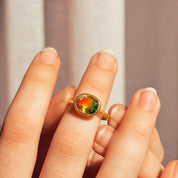 Model placing a pink, yellow, and green tricolor watermelon crystal quartz oval ring on hand. 18K Vermeil Gold Oval Ring, Summer Jewelry, Watermelon Jewelry, Solitaire Ring, Dainty Gold Stacking Ring Gift for Her