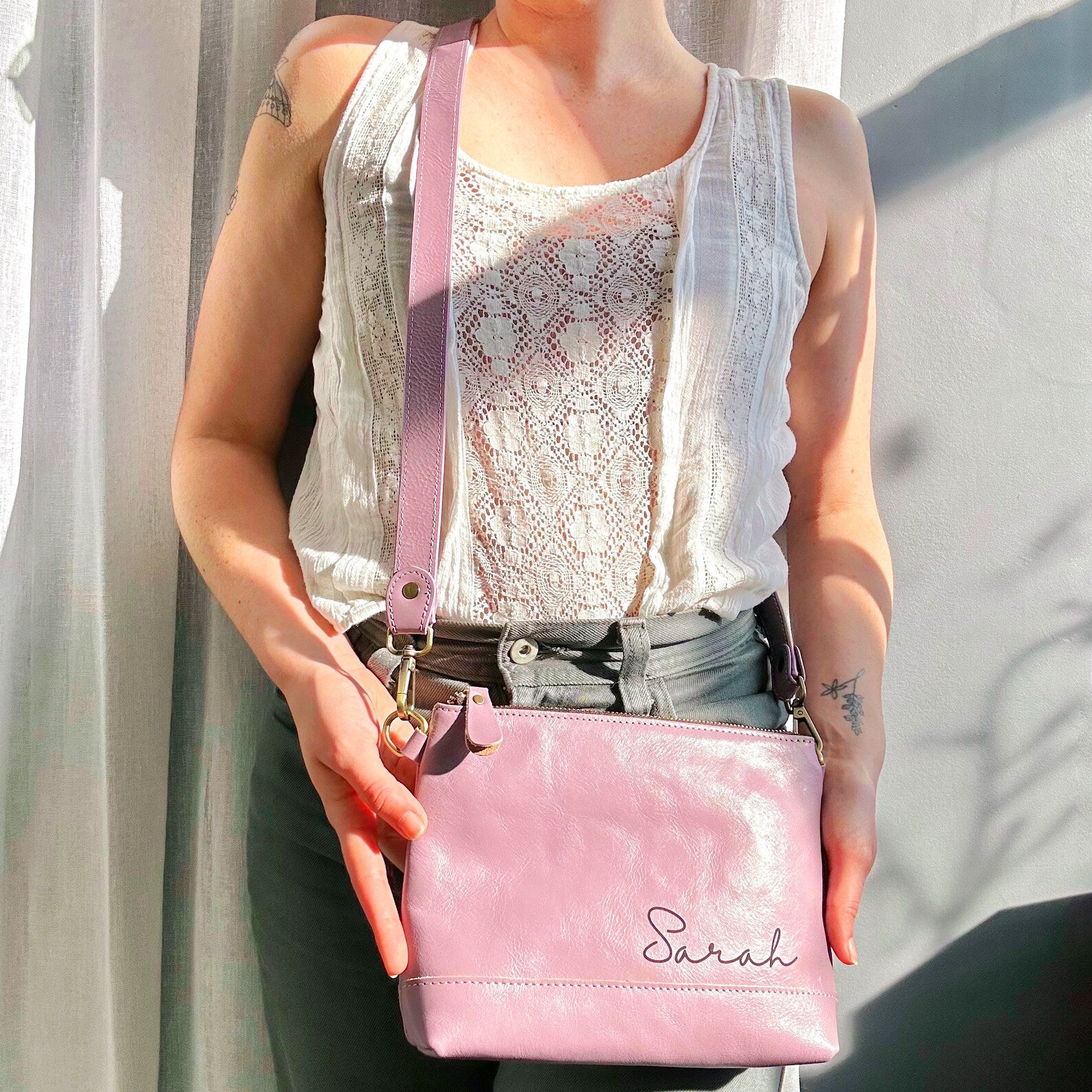 Lavender Light Purple Crossbody Bag Engraved in Cursive Font Name on a model wearing ann taylor top. Genuine Leather Purse for Daughter or  Niece. Customized Leather Purse for Her.