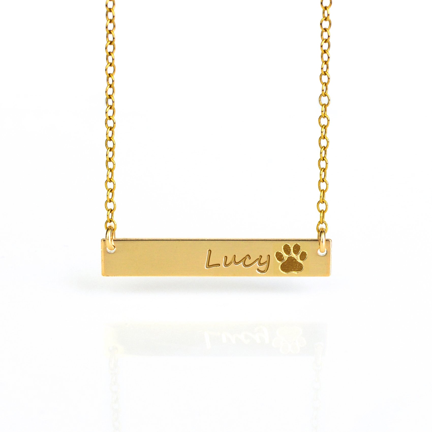 A gold pet name and paw print necklace. Engraved pet bar necklace, personalized pet memorial jewelry, sterling silver pet necklace, gold-filled pet necklace, rose gold-filled bar necklace, custom pet keepsake, dog or cat name necklace, pet lover gift, engraved front or back, pet loss gift, pet remembrance jewelry