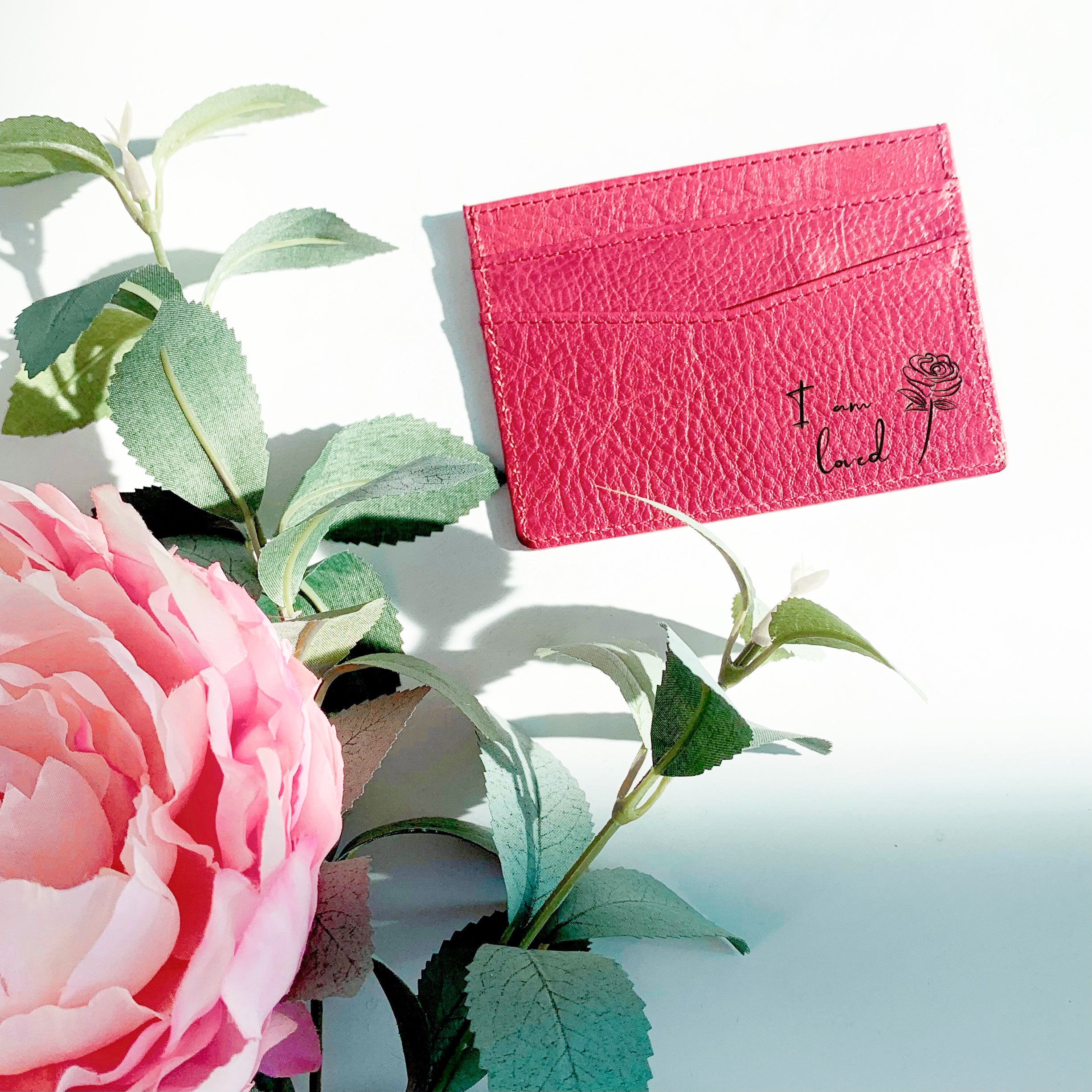 Gift your loved one with the raspberry I am loved rose card holder