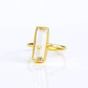 Gemstone April clear quartz bar ring, handcrafted gemstone jewelry, bohemian style ring, natural quartz stone, gold setting, unique bar ring, artisan made, gemstone ring for women, southwestern jewelry, rustic quartz ring, earthy gemstone ring, quartz band