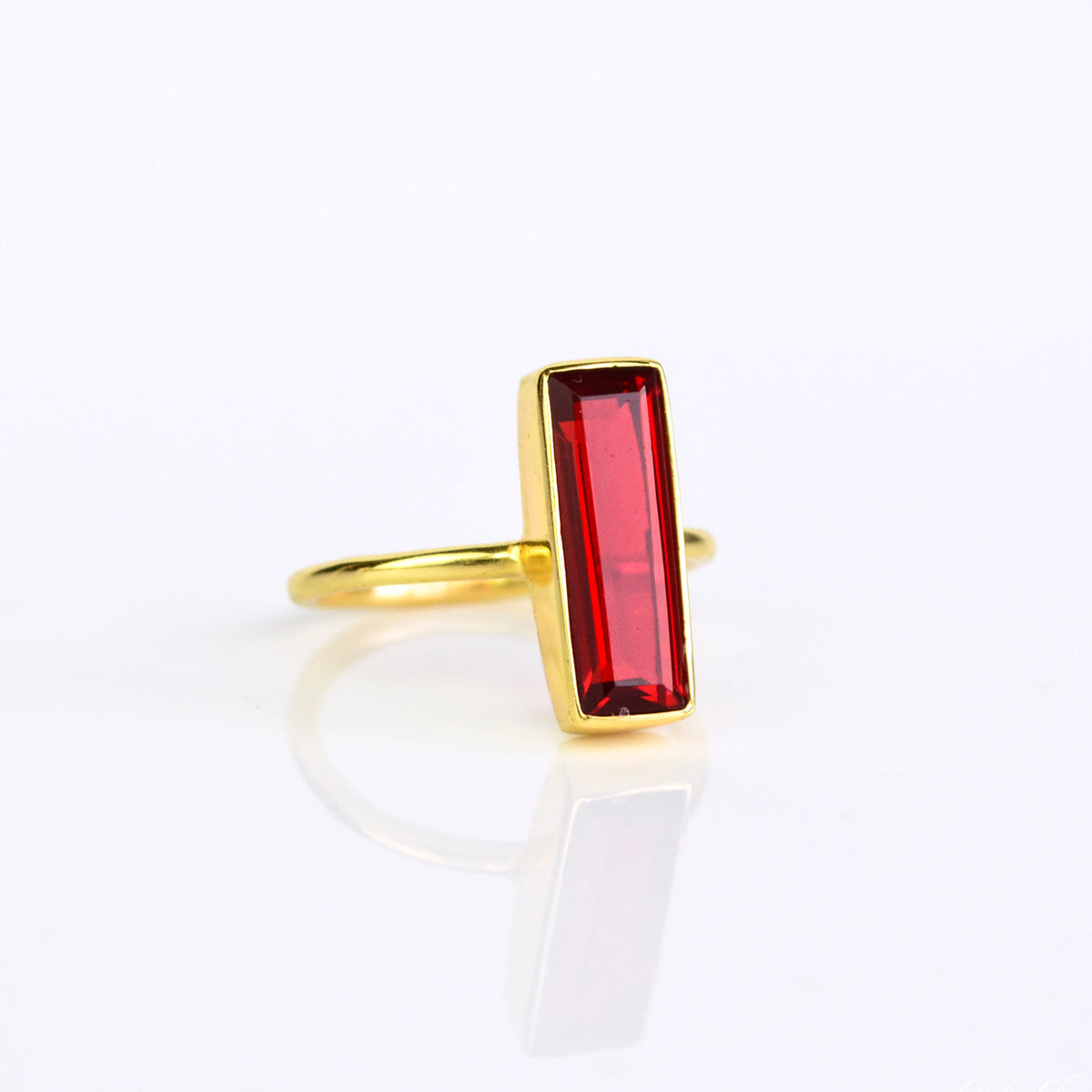 A gold garnet bar ring. Garnet bar ring, January birthstone jewelry, handcrafted gemstone ring, deep red garnet, minimalist bar ring, garnet and silver ring, garnet gold ring, boho style, artisan garnet ring, stacking gemstone ring, garnet in rose gold, garnet statement ring