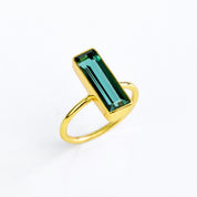 Green tourmaline bar ring, handcrafted gemstone jewelry, vibrant green tourmaline, minimalist ring, green tourmaline in gold, silver tourmaline ring, boho style, artisan green tourmaline ring, stacking gemstone ring, unique tourmaline jewelry, elegant green ring