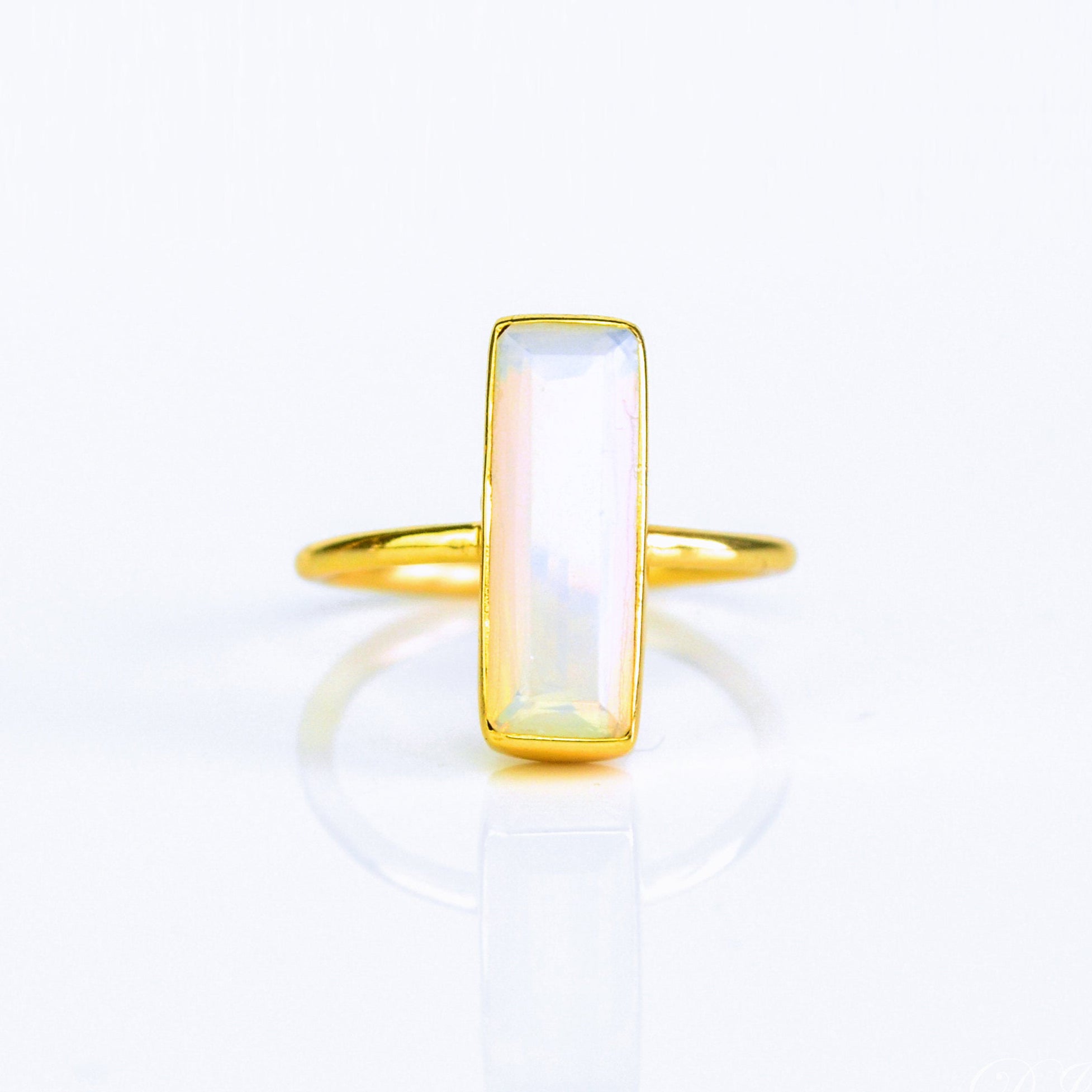 Natural Opalite jewelry, iridescent gemstone ring, bar style Opalite, minimalist Opalite ring, bezel-set stone, Adira Series, unique iridescent design, October birthstone alternative, eye-catching Opalite ring, elegant jewelry, stylish accessory