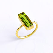 Peridot ring, August birthstone jewelry, vibrant green gemstone, unique Peridot bar ring, minimalist design, bezel-set Peridot, Adira Series, eye-catching Peridot ring, stylish green gemstone, elegant Peridot accessory