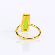 August birthstone ring, Peridot gemstone jewelry, vibrant green Peridot bar ring, unique design, minimalist Peridot, bezel-set gemstone, Adira Series, eye-catching Peridot ring, stylish green jewelry, elegant Peridot accessory