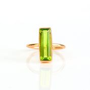 Natural Peridot jewelry, August birthstone ring, vibrant green Peridot bar style, minimalist design, bezel-set Peridot, Adira Series, unique green gemstone, eye-catching jewelry, elegant Peridot ring, stylish gemstone accessory