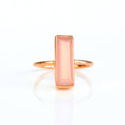 Pink Chalcedony gemstone ring, October birthstone, delicate pink Chalcedony, unique bar design, minimalist pink ring, bezel-set Chalcedony, Adira Series, elegant pink jewelry, eye-catching gemstone, stylish Chalcedony accessory