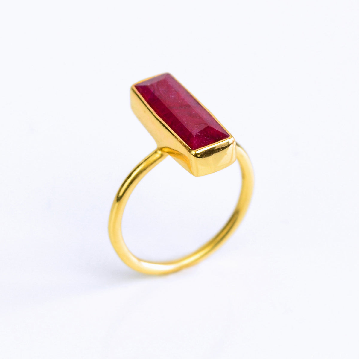 Red Ruby gemstone bar ring, July birthstone alternative, rich red Ruby, unique minimalist design, bezel-set Ruby, Adira Series, stylish red jewelry, elegant Ruby ring, eye-catching gemstone, fashion-forward Ruby