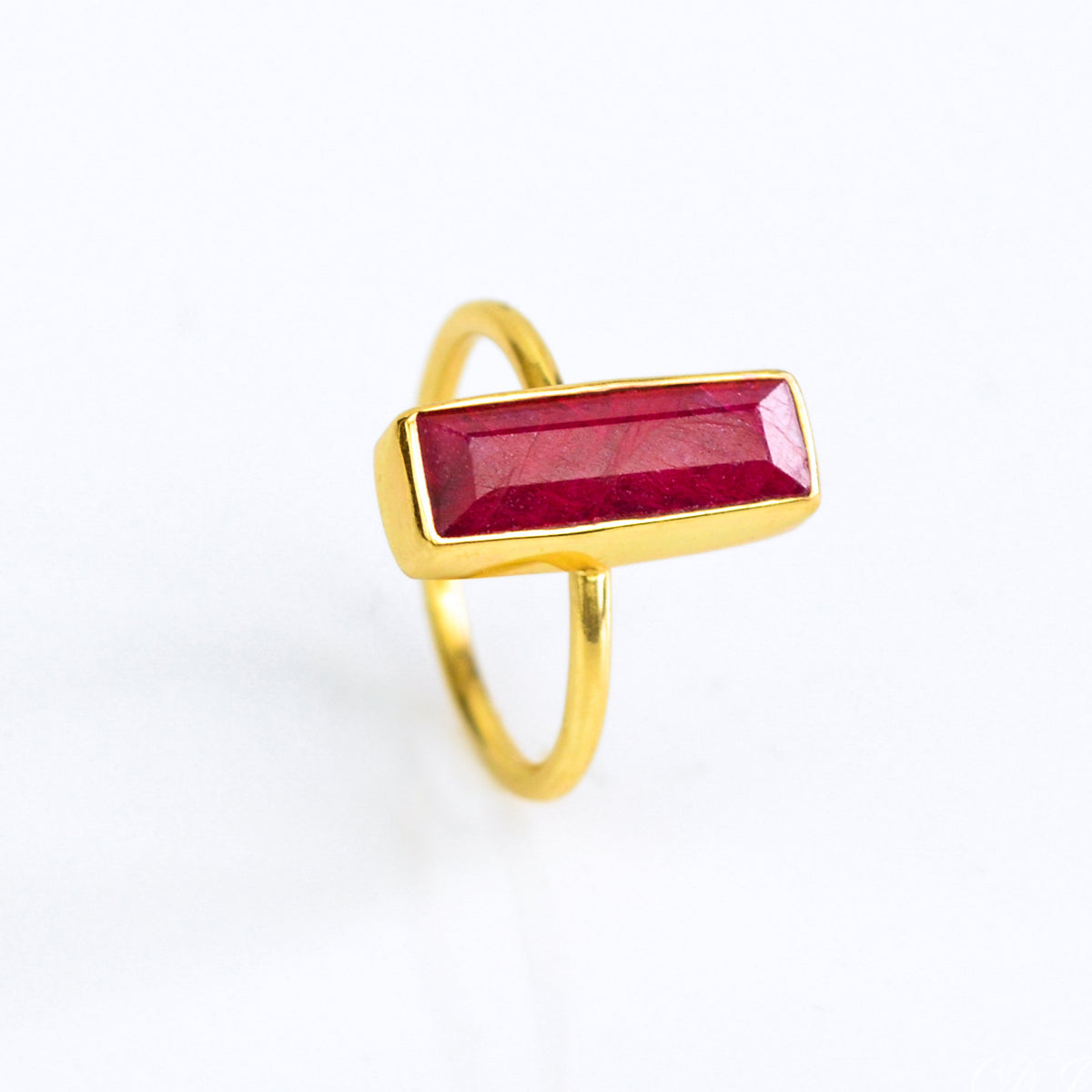 Ruby bar ring, July birthstone jewelry, vibrant red gemstone, unique Ruby design, minimalist ring, bezel-set stone, Adira Series, eye-catching red Ruby, elegant jewelry, stylish accessory