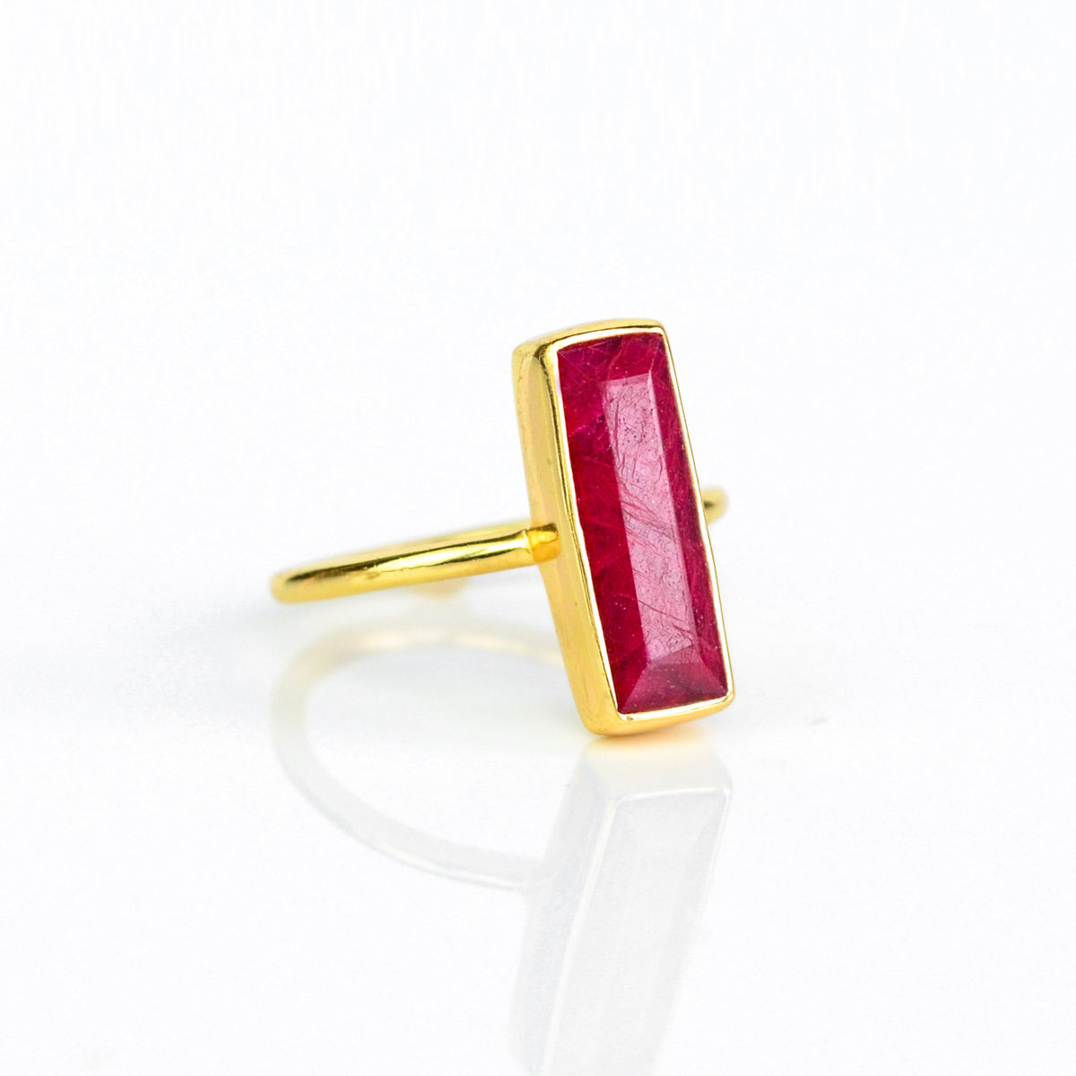 Ruby ring, July birthstone jewelry, vibrant red gemstone, unique Ruby bar ring, minimalist design, bezel-set Ruby, Adira Series, eye-catching red gemstone, stylish jewelry, elegant Ruby accessory