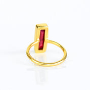 July birthstone ring, Ruby gemstone, striking red Ruby bar design, unique minimalist ring, bezel-set Ruby, Adira Series, eye-catching red jewelry, elegant Ruby, stylish gemstone accessory, fashion-forward Ruby ring