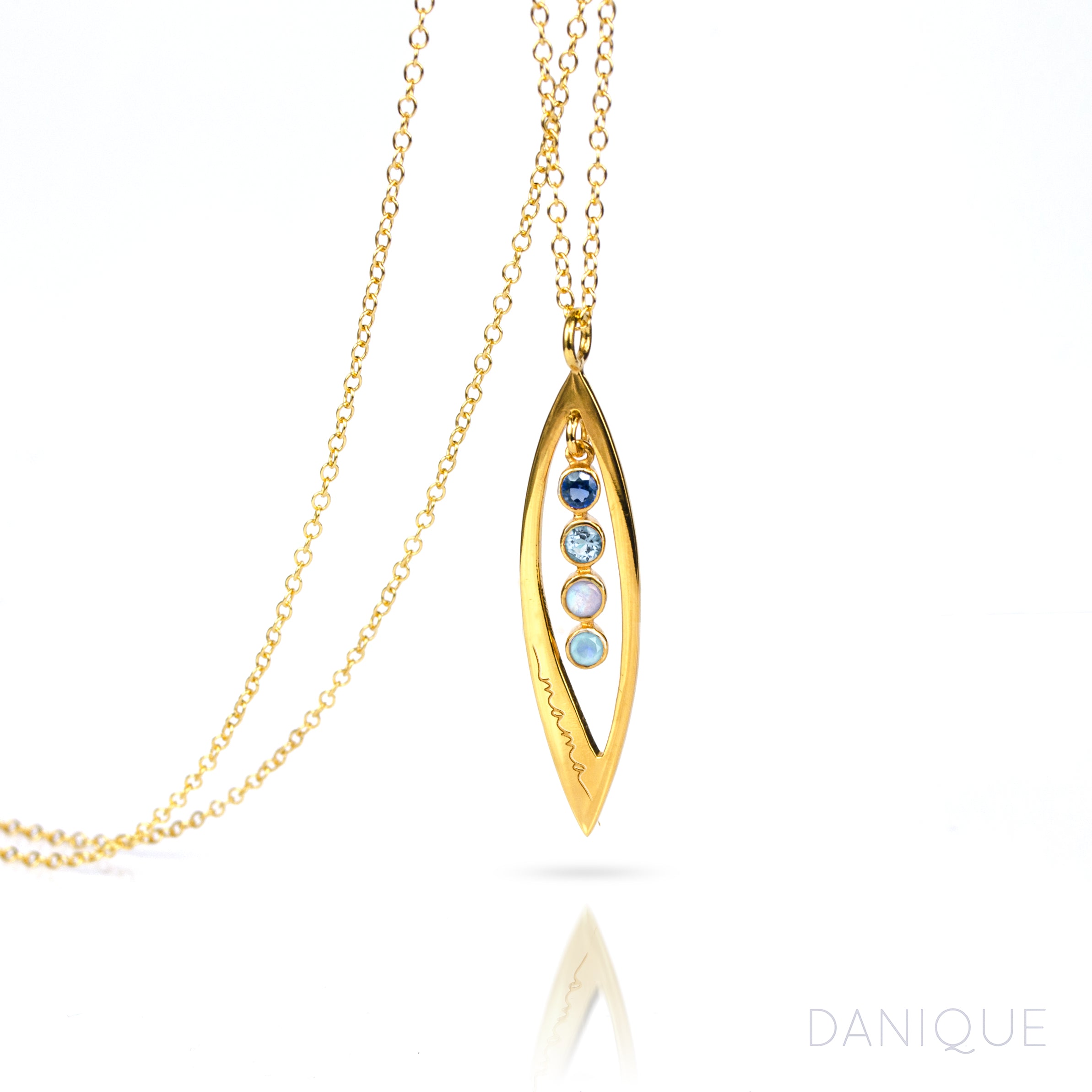 elongated-leaf-small-stones-pendant-gold.jpg