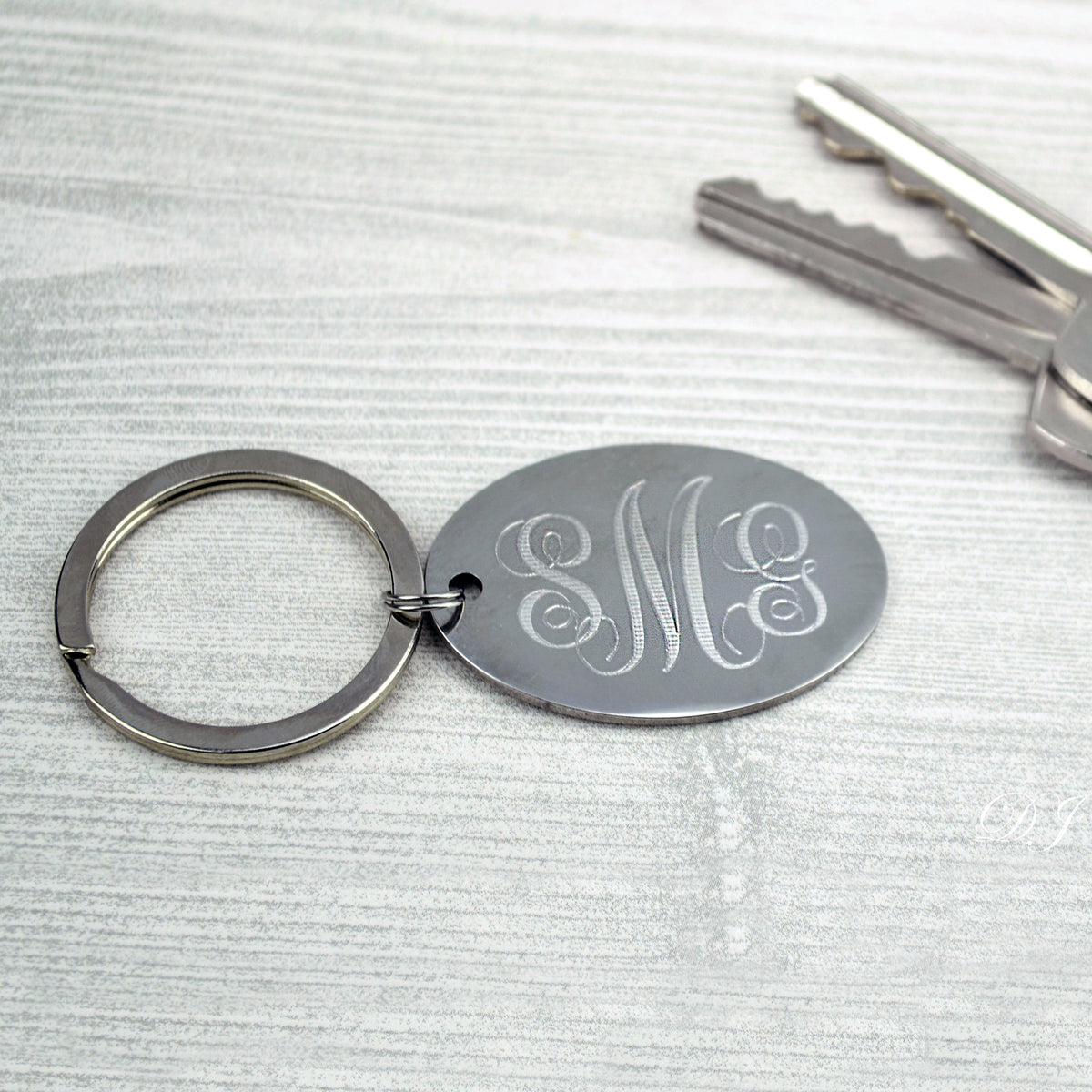 KK's Silver Secrets Monogram Keychain